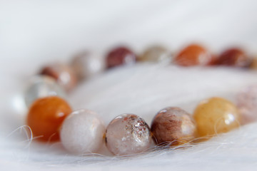 Jewelry with natural synthetic stone bracelet. Beautiful semiprecious stone beads