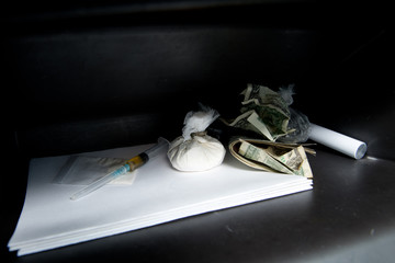 drug dealer car glove box with drug doses for sample