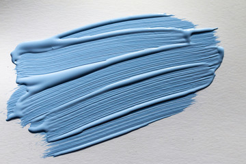 Blue colored paint brush stroke
