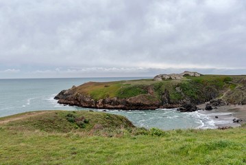 Landscape of green elevated peninsula along the Oregon Coast