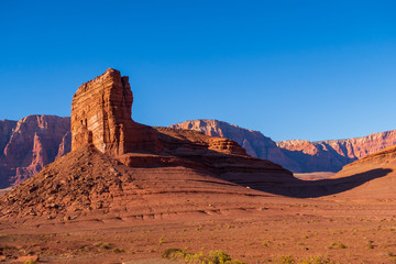 Landscape of barren red hillside and terrain at Marble Canyon in Glen Canyon National Recreation Area in Arizona