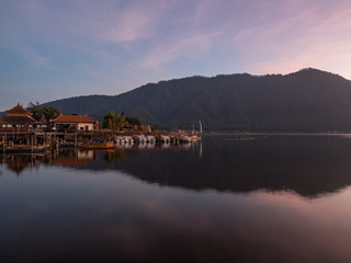 Indonesia, november 2019: A beautiful sunrise at a Lake Bratan with UlunDanu temple,Bali