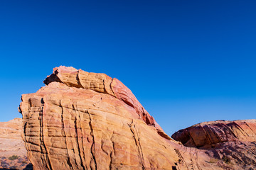 Fototapeta premium Low angle landscape of colorful rock formations at Valley of Fire State Park in Nevada