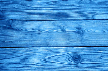 background of classic blue color old wooden boards. color 2020