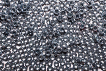 shiny steel nuts in close-up