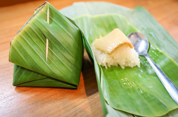 Sticky rice wrapped in banana leaf custard