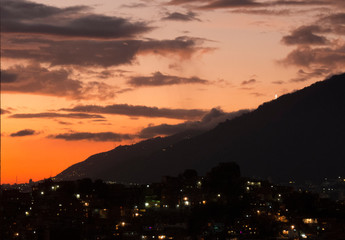 December sunset in caracas with the Avila cross