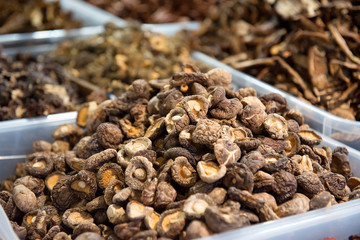 Dried champignons on the counter in the store.