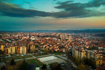 Fototapeta na wymiar Aerial view of Kragujevac, town in central Serbia at sunset