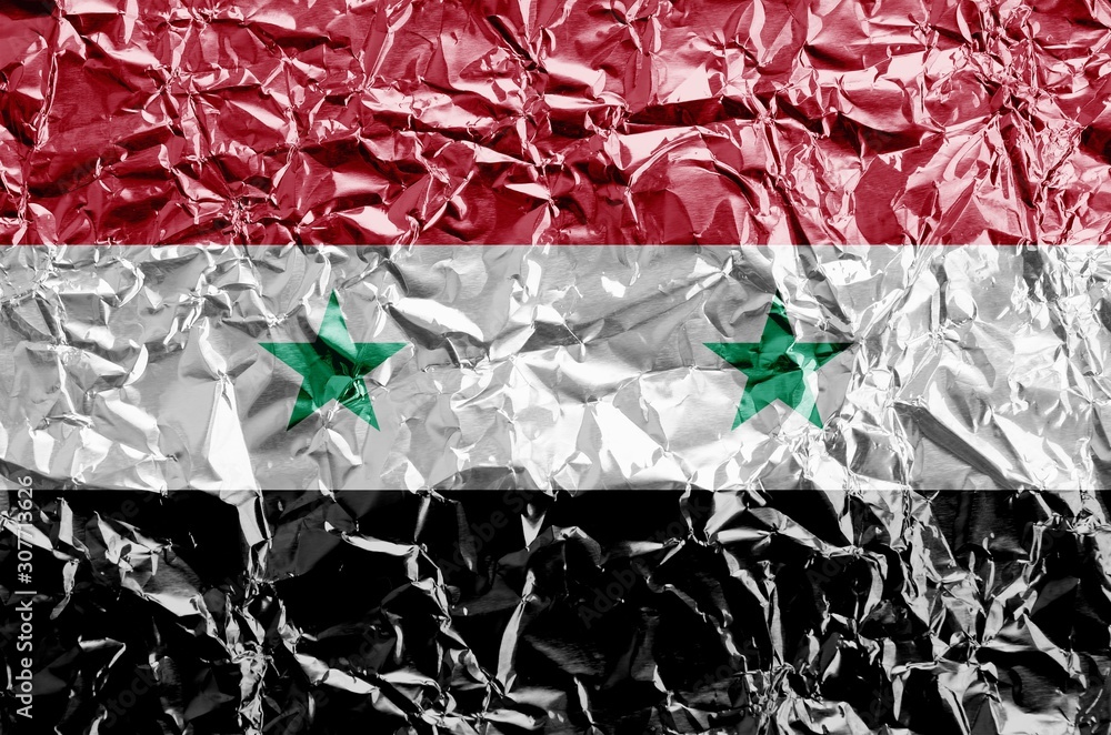 Poster Syria flag depicted in paint colors on shiny crumpled aluminium foil closeup. Textured banner on rough background