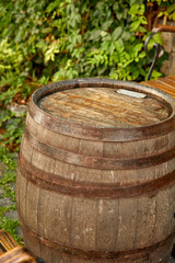 old wine barrel on the paving stones