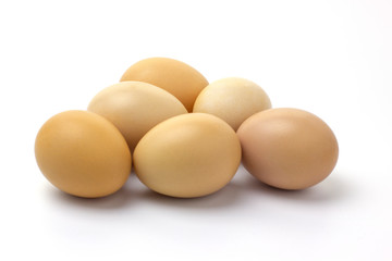 Fresh chicken eggs isolated on white background. Food for cooking.