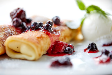 pancakes with berries and ice cream