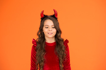 Young and carefree. trick or treat. happy halloween. cheerful little girl halloween party. devil inside of me. she has bad character. autumn holiday celebration. small child red horns. cute imp