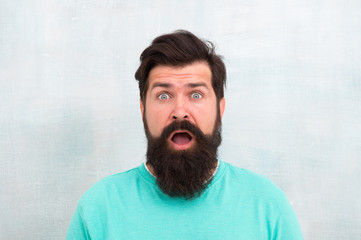 Shocked. Wondering what. Hipster appearance. Man bearded hipster stylish beard. Stylish beard and mustache care. Beard fashion and barber concept. Perceptions of male beauty around the world