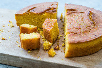 Fresh Baked Corn Bread Slices on Wooden Board.
