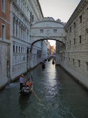 Fototapeta na wymiar Morning Gondola Ride on a Venetian Canal
