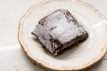 Homemade Organic Healthy Dessert Custard Brownie Pudding Powdered Sugar.