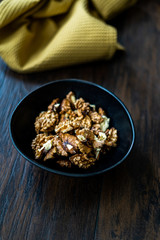 Walnut Kernels and Whole walnuts in Porcelain Bowl.