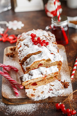 Stollen is fruit bread of nuts, spices, dried or candied fruit, coated with powdered sugar. It is traditional German bread eaten during the Christmas season. New year prep.