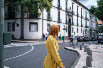 Fototapeta premium woman walking on the street