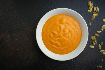 pumpkin soup (first course, delicious vegetable vitamin food) menu concept. food background. copy space. Top view