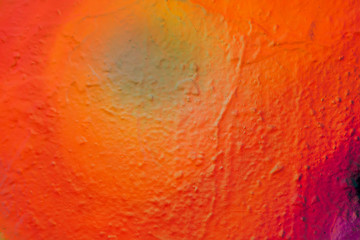 Beautiful bright colorful street art graffiti background. Abstract creative spray drawing fashion colors on the walls of the city. Urban , pink ,red ,orange , yellow, green, crimson , purple texture