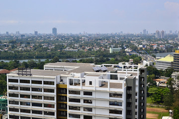 Colombo, Sri Lanka - February, 2017: City skyline view. Office building on a foreground. Panoramic...
