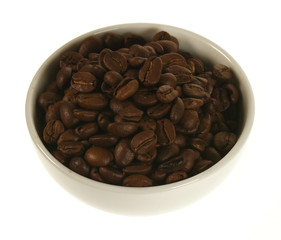 coffee beans in a cup isolated on white