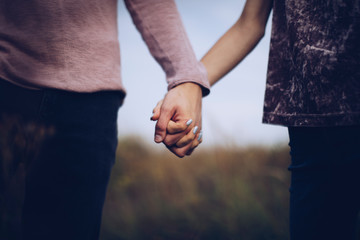 couple holding hands
