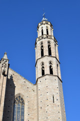 Fototapeta na wymiar Detail of Tall Stone Belltower on Barcelona Cathedral 3658-039