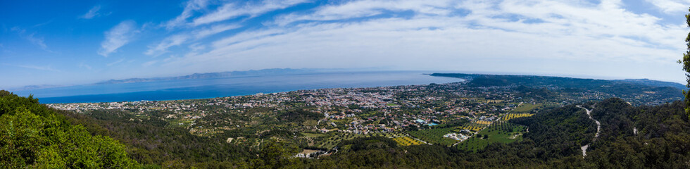 View of Ialyssos from Mount Filerimos. Blue Sea and Mountains in summer in Greece