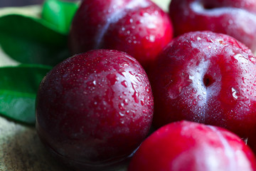 Fresh delicious ripe plums close-up. Shallow DOF.