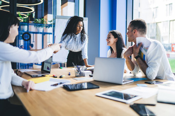 Fototapeta premium Businesswoman talking to employees on conference