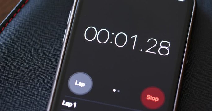Numerical digital stopwatch with white number and black screen on cellphone