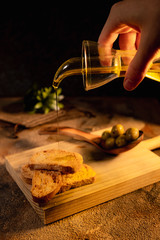 Healthy breakfast. Olive oil toast on black background top view. Spanish food
