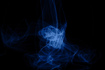 Blue neon intertwined smoke. Isolated on black background. Color of the year 2020 concept. Abstract black background. Neon lights texture.