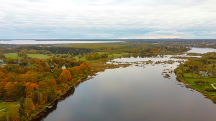 Doles Sala is  the Second Largest Island in Latvia. This is a Peninsula in the Daugava River, Near the Borders of Riga. Aerial Dron Shoot. Sunny Autumn Day.