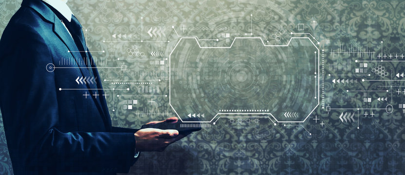 Technology screen with businessman holding a tablet computer