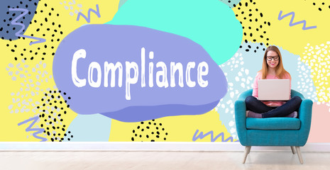 Compliance with young woman using her laptop in a chair