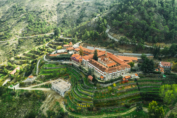 Machairas Monastery in Cyprus mountains, aerial view from drone, beautiful ancient monastery, toned
