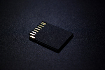 SD card on a dark metal background