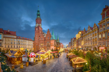 Christmas market on Rynek square at dusk in Wroclaw, Poland