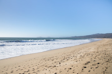 Fototapeta na wymiar Wide angle view of a sandy beach coastline