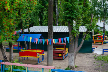 Empty playground in the midday heat.
