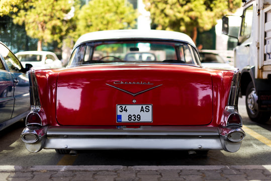 Back side logo of a Red 1957 Chevrolet.