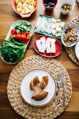 Turkish traditional Breakfast with bagel (Turkish Simit), blur background and in front of the photo there is Turkish Bagel