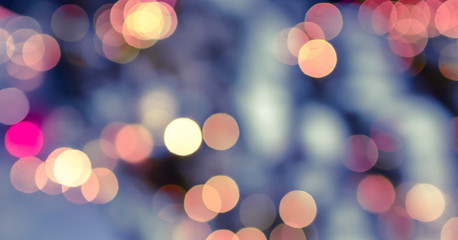 Fototapeta premium Blurry lights banner and abstract Christmas colorful background. Xmas and New Year holiday bokeh concept.