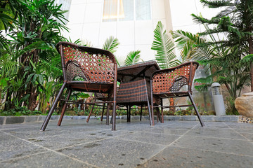 Fototapeta na wymiar rattan chair in the park