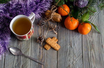 The tangerines, christmas cookies and a cup of herbal tea